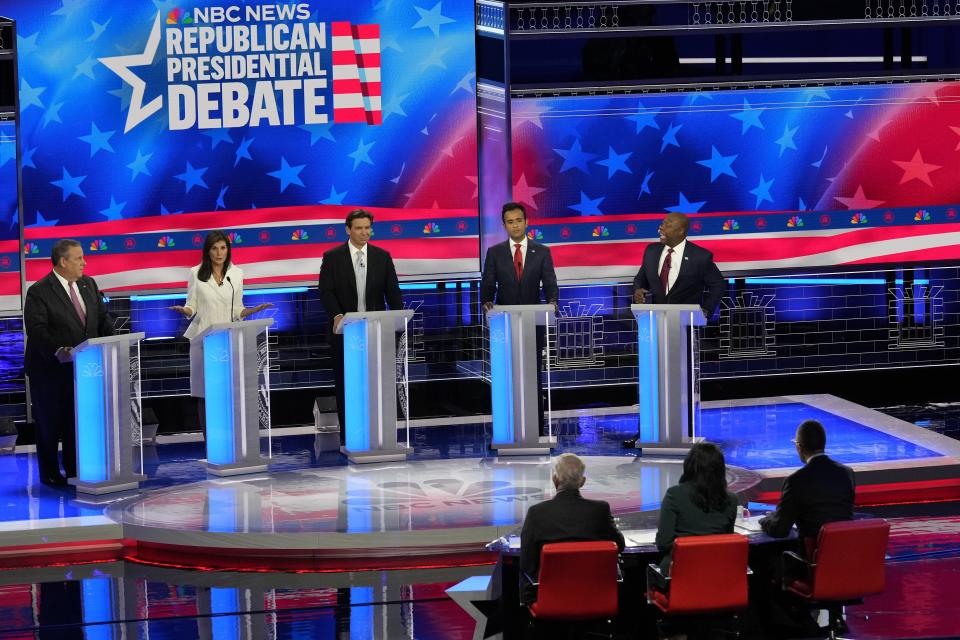 Republican presidential candidates from left, former New Jersey Gov. Chris Christie, former UN Ambassador Nikki Haley, Florida Gov. Ron DeSantis, businessman Vivek Ramaswamy and Sen. Tim Scott, R-S.C., participate in a Republican presidential primary debate hosted by NBC News Wednesday, Nov. 8, 2023, at the Adrienne Arsht Center for the Performing Arts of Miami-Dade County in Miami. | Rebecca Blackwell, Associated Press