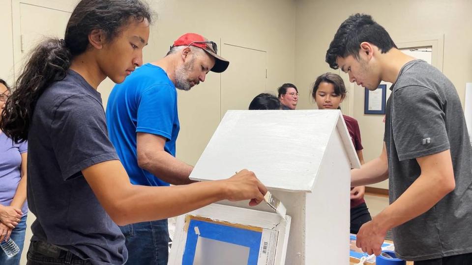 Volunteers build Little Free Library book boxes at the King-Kennedy Memorial Center during Love Modesto community service day in Modesto, Calif., Saturday, April 29, 2023.