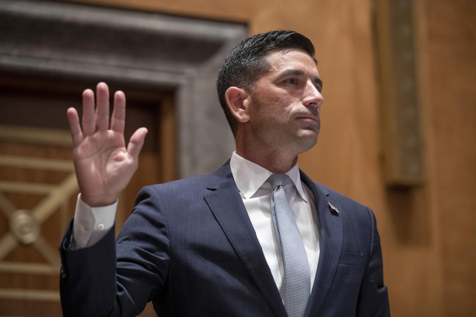 FILE - In this Sept. 23, 2020, file photo, Acting Secretary of Homeland Security Chad Wolf is sworn in before the Senate Homeland Security and Governmental Affairs committee during his confirmation hearing, on Capitol Hill in Washington. On Saturday, Nov. 14, 2020, a federal judge in New York ruled that Wolf assumed his position unlawfully, a determination that invalidated Wolf's suspension of the Deferred Action for Childhood Arrivals program, which shields young people from deportation. (Shawn Thew/Pool Photo via AP, File)