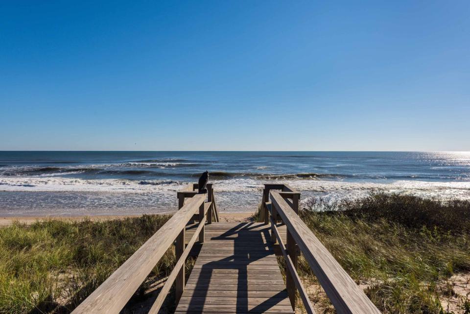 A private path leads to the beach.