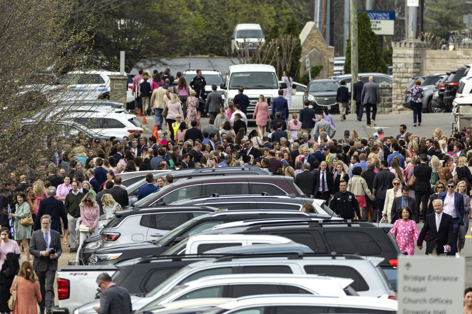 Mourners gather after a funeral service held for The Covenant School shooting victim Evelyn Dieckhaus at the Woodmont Christian Church Friday, March 31, 2023, in Nashville, Tenn. (AP Photo/Wade Payne)