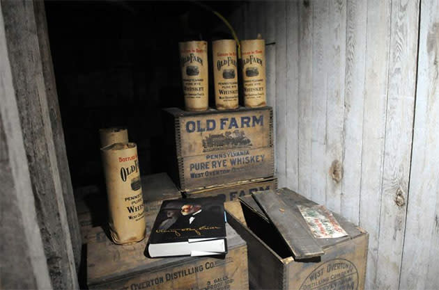 Bottles of Old Farm whiskey at South Broadway Manor Bed and Breakfast. (Sean Stipp/Tribune-Review)