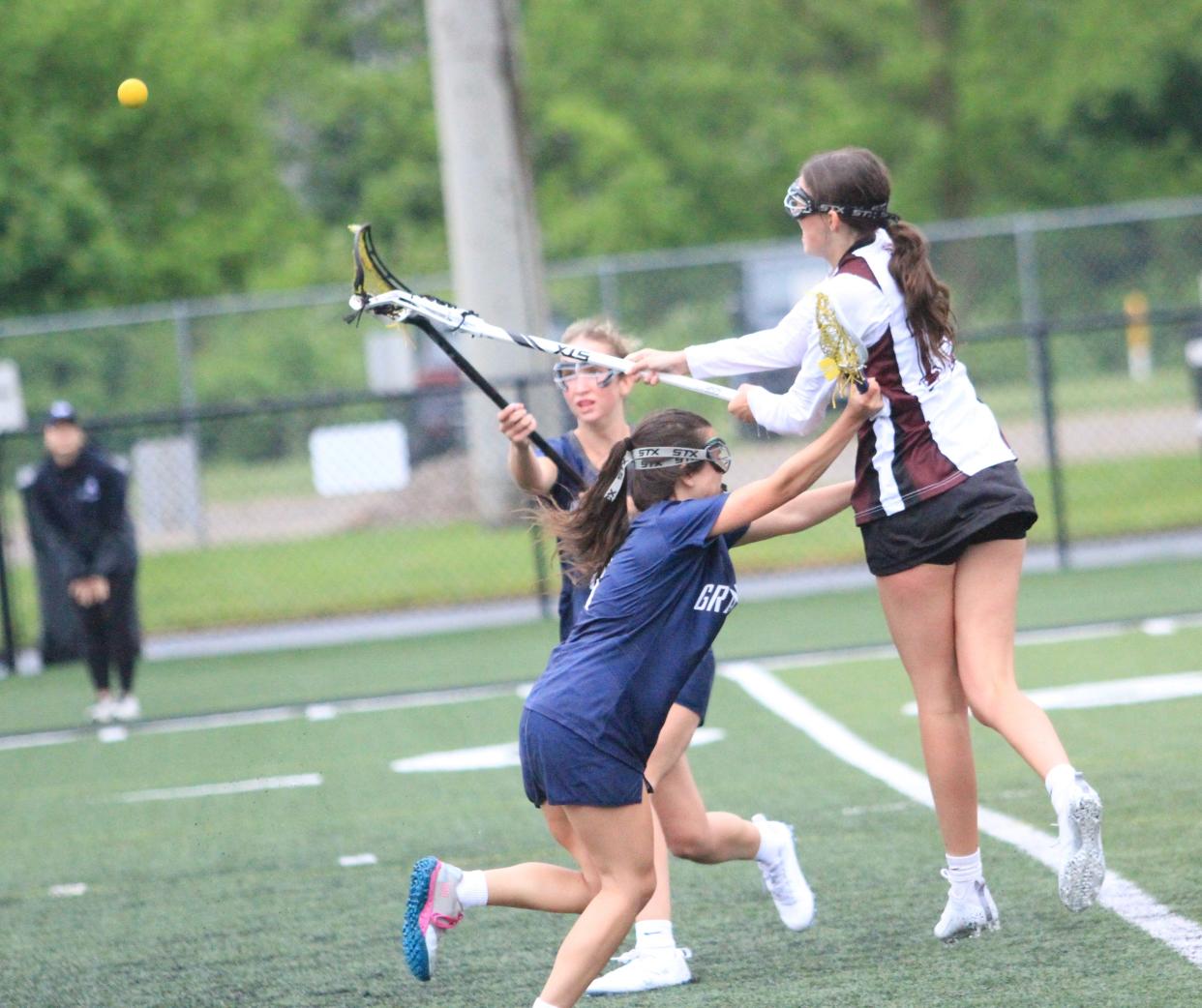 Newark's Emily Tracey shoots during visiting Granville's 17-2 victory at White Field on Thursday, May 9, 2024.
