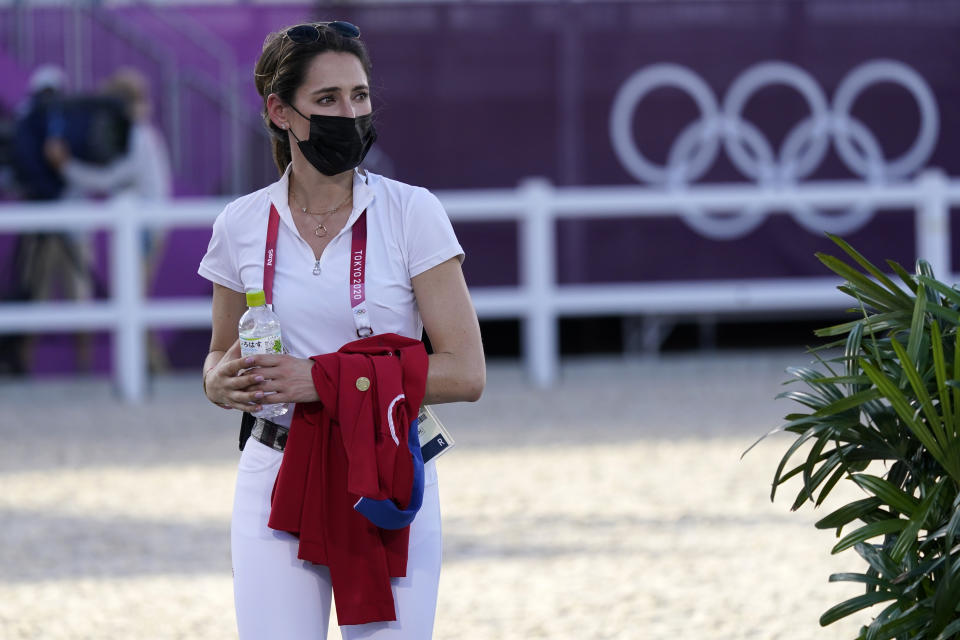 United States' Jessica Springsteen walks the course ahead of the equestrian jumping individual qualifying at Equestrian Park in Tokyo at the 2020 Summer Olympics, Tuesday, Aug. 3, 2021, in Tokyo, Japan. (AP Photo/Carolyn Kaster)