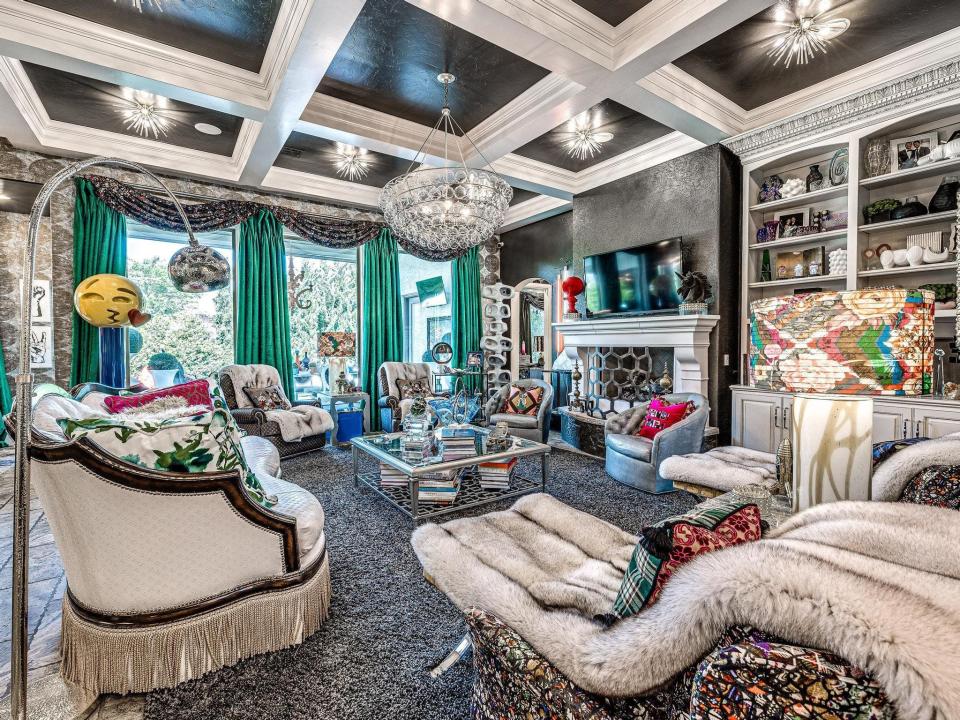 The listing agent for an unusual home for sale at 17405 Hawks View Court says it features "coffered ceilings in the connected living area with a beautiful fireplace."