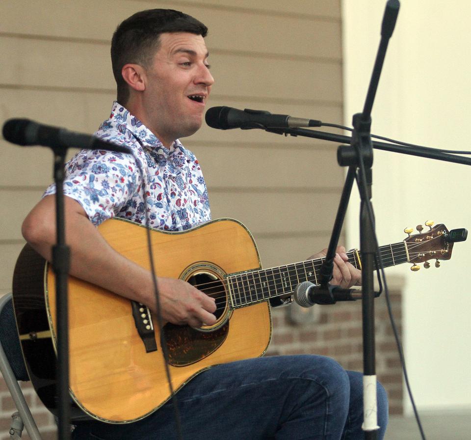 Josh Goforth plays his guitar at Bluegrass Fest in Millersville, Tenn., in 2022.
