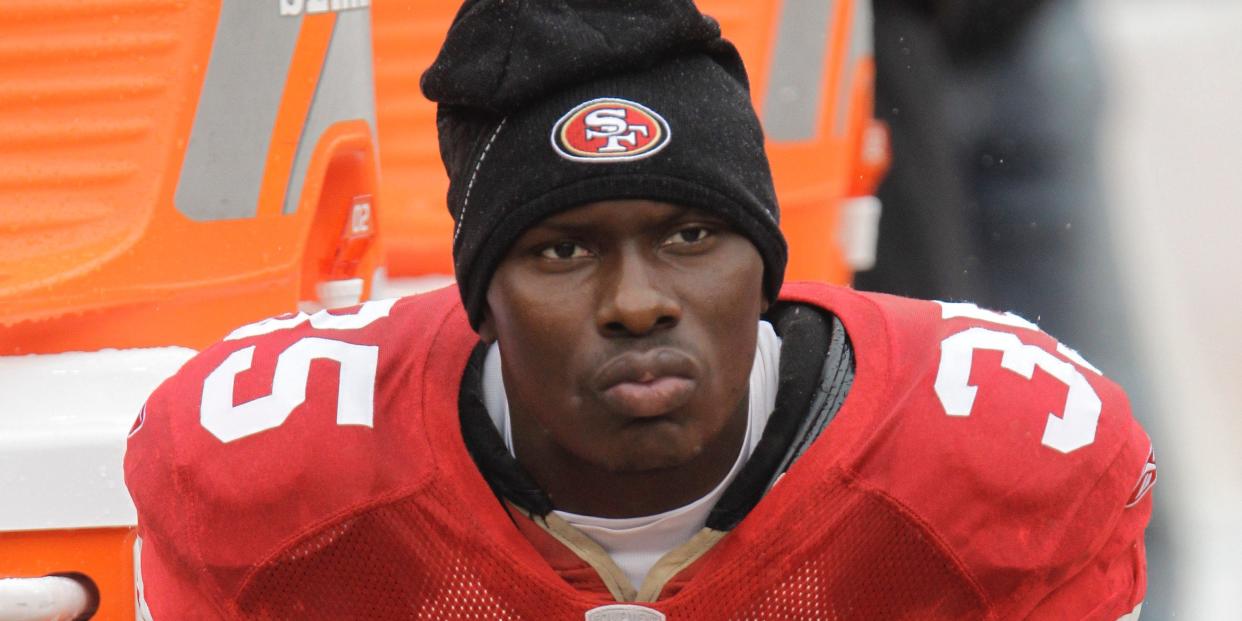 In this Oct. 17, 2010 file photo, San Francisco 49ers cornerback Phillip Adams (35) sits on the sideline during the first quarter of an NFL football game in San Francisco.