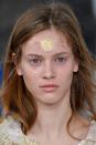 <p><strong>Trend: glitter</strong></p><p>Preen never fails to excite with the beauty looks during their London Fashion Week show and this season, with Korean female divers (searching for pearls) as the collection's inspiration, glitter took centre stage. To make their skin dewy, as if the models had just emerged from the water, Mac's <a rel="nofollow noopener" href="https://www.maccosmetics.co.uk/product/13825/32212/products/skincare/primers/prep-prime-fix#/shade/Original" target="_blank" data-ylk="slk:Prep + Prime Fix;elm:context_link;itc:0;sec:content-canvas" class="link ">Prep + Prime Fix</a>, £19, and <a rel="nofollow noopener" href="https://www.maccosmetics.co.uk/product/13824/1130/products/skincare/moisturizers/studio-moisture-cream" target="_blank" data-ylk="slk:Studio Moisture Cream;elm:context_link;itc:0;sec:content-canvas" class="link ">Studio Moisture Cream</a>, £25, were applied to the skin, followed by <a rel="nofollow noopener" href="https://www.maccosmetics.co.uk/product/13848/9618/products/makeup/face/multi-use/mixing-medium-shine" target="_blank" data-ylk="slk:Mixing Medium Shine;elm:context_link;itc:0;sec:content-canvas" class="link ">Mixing Medium Shine</a>, £16.50. Then Glitters in Iridescent White, available this spring, was blown into the centre of the models' forehead and allowed to drift into the hairline. </p>