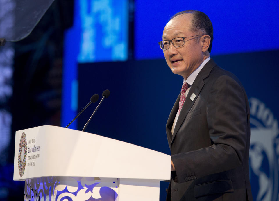 World Bank President Jim Yong Kim delivers his speech during the opening of International Monetary Fund (IMF) World Bank annual meetings in Bali, Indonesia on Friday, Oct. 12, 2018. (AP Photo/Firdia Lisnawati)