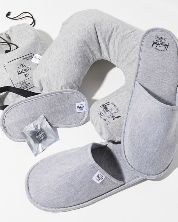 <p>Nomads and business travelers alike agree that flying is all about comfort. They’ll also agree on this cozy travel amenity kit complete with plush slippers, a comfy neck pillow and the all-important sleep mask.<br><strong><a rel="noopener" href="https://fave.co/2QoyxKH" target="_blank" data-ylk="slk:SHOP IT;elm:context_link;itc:0;sec:content-canvas" class="link ">SHOP IT</a>:</strong> $30, <a rel="noopener" href="https://fave.co/2QoyxKH" target="_blank" data-ylk="slk:urbanoutfitters.com;elm:context_link;itc:0;sec:content-canvas" class="link ">urbanoutfitters.com</a> </p>