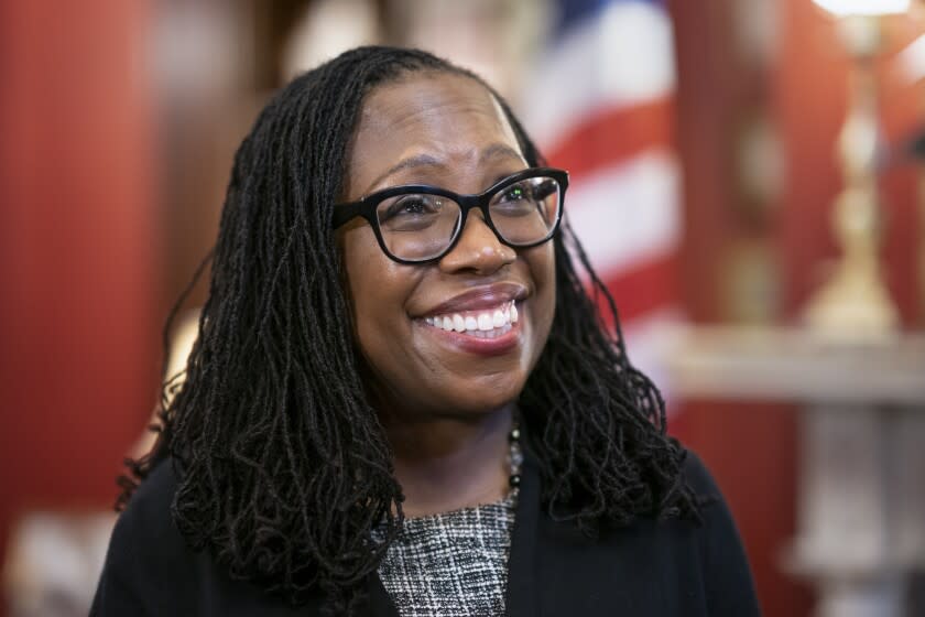 FILE - Supreme Court nominee Judge Ketanji Brown Jackson smiles as Sen. Richard Shelby, R-Ala., arrives for a meeting in his office on Capitol Hill in Washington, March 31, 2022. The first Black woman confirmed for the Supreme Court, Jackson, is officially becoming a justice. Jackson will be sworn as the court's 116th justice at midday Thursday, June 30, just as the man she is replacing, Justice Stephen Breyer, retires. (AP Photo/J. Scott Applewhite, File)