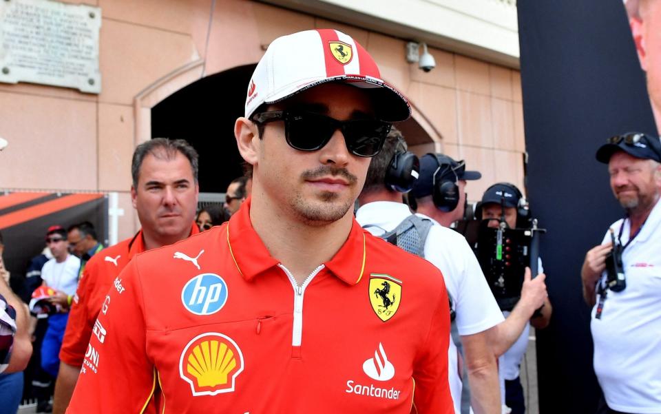 Charles Leclerc walking through the paddock