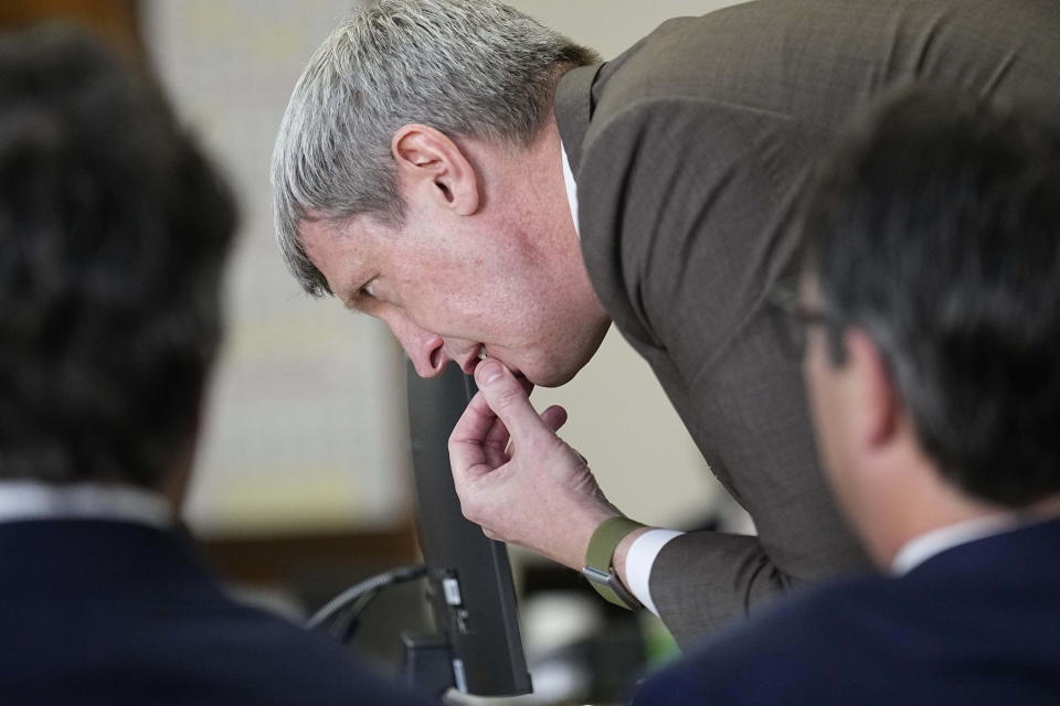 Eric Olson, attorney for the petitioners, looks over some notes during a hearing for a lawsuit to keep former President Donald Trump off the state ballot, Tuesday, Oct. 31, 2023, in Denver. (AP Photo/Jack Dempsey, Pool)