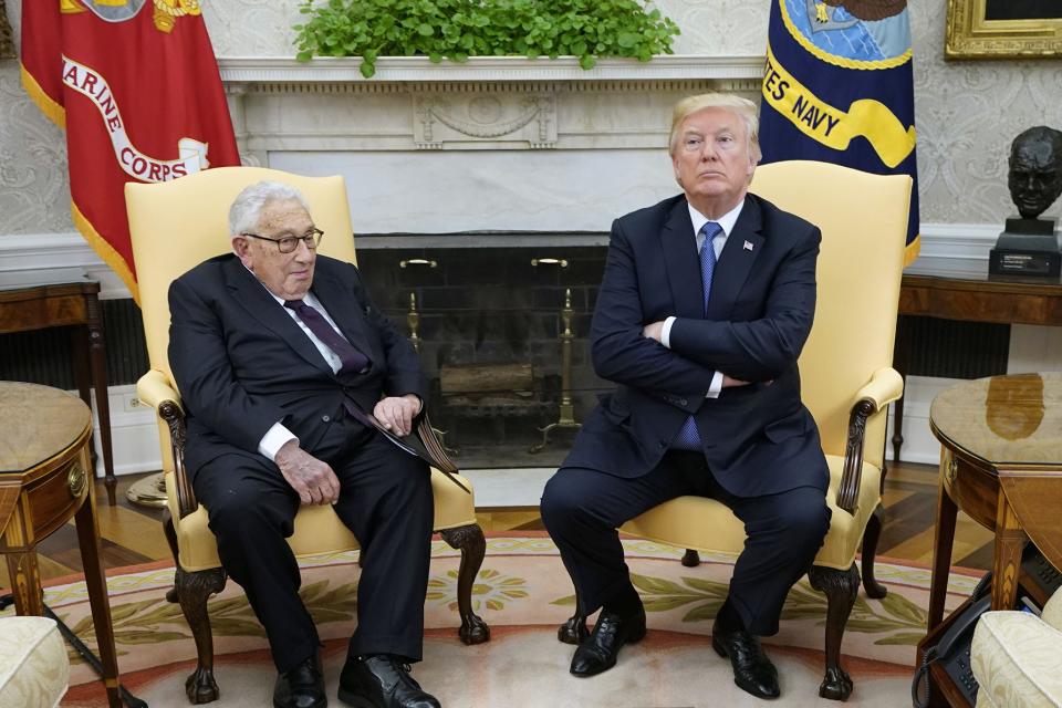 US President Donald Trump (R) meets with former US Secretary of State Henry Kissinger in the Oval Office of the White House on 10 October 2017 in Washington, DC. (AFP/Getty)