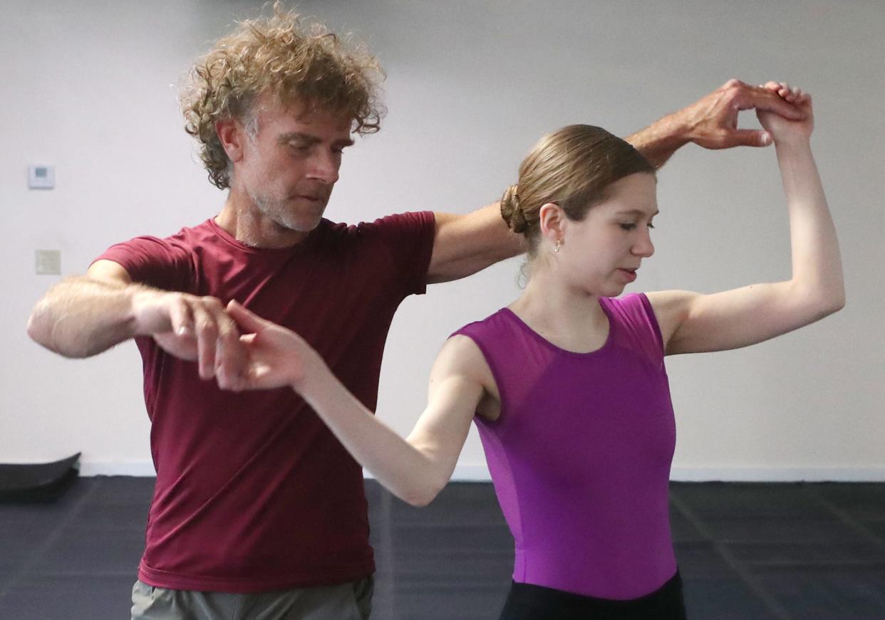 Dancers Brian Murphy and Lieneke Matte rehearse for "Resilient Minds: Artistry after Injury." The event, created by the Brain Injury Association of Ohio, is aimed at raising awareness about brain injuries and honoring the resilience of survivors.