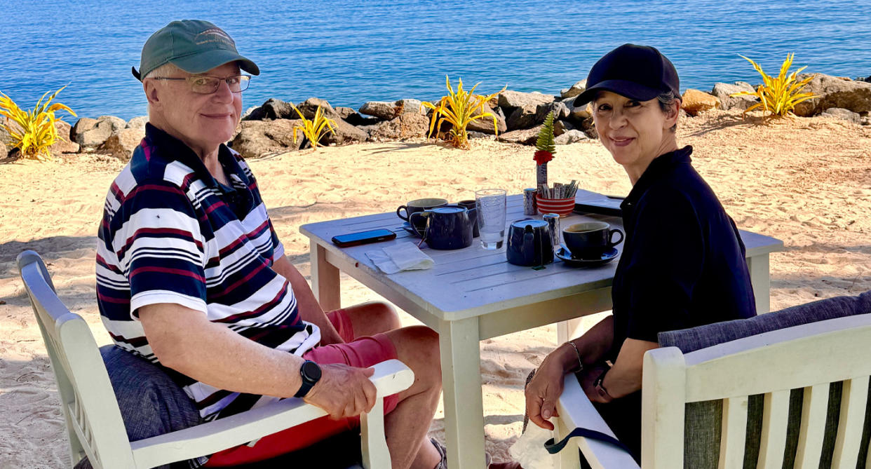 Shirley Becke and her husband easting breakfast in Fiji. 