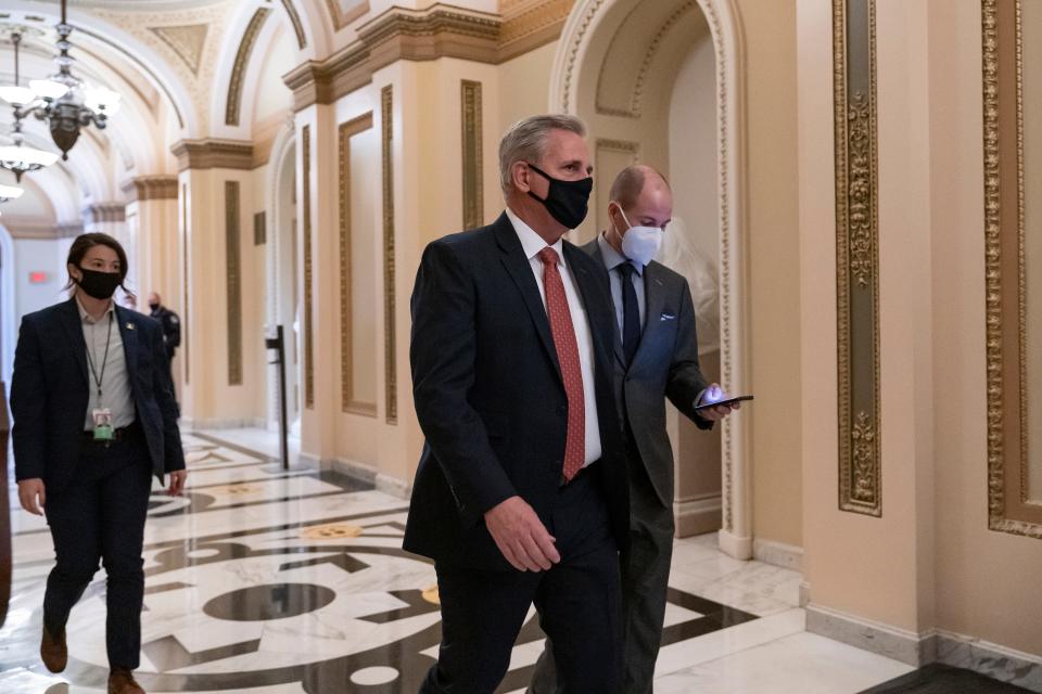 House Minority Leader Kevin McCarthy, R-Calif., walks to the chamber at the Capitol in Washington on Wednesday.