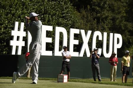 Sep 21, 2018; Atlanta, GA, USA; Tiger Woods tees off on the 12th hole during the second round of the Tour Championship golf tournament at East Lake Golf Club. Mandatory Credit: John David Mercer-USA TODAY Sports