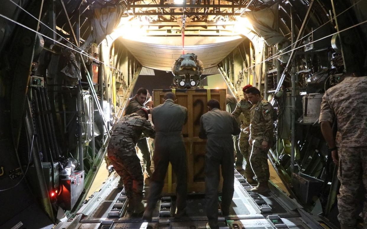 Jordan's air force personnel air-dropping urgent medical aid to the Jordanian field hospital in Gaza