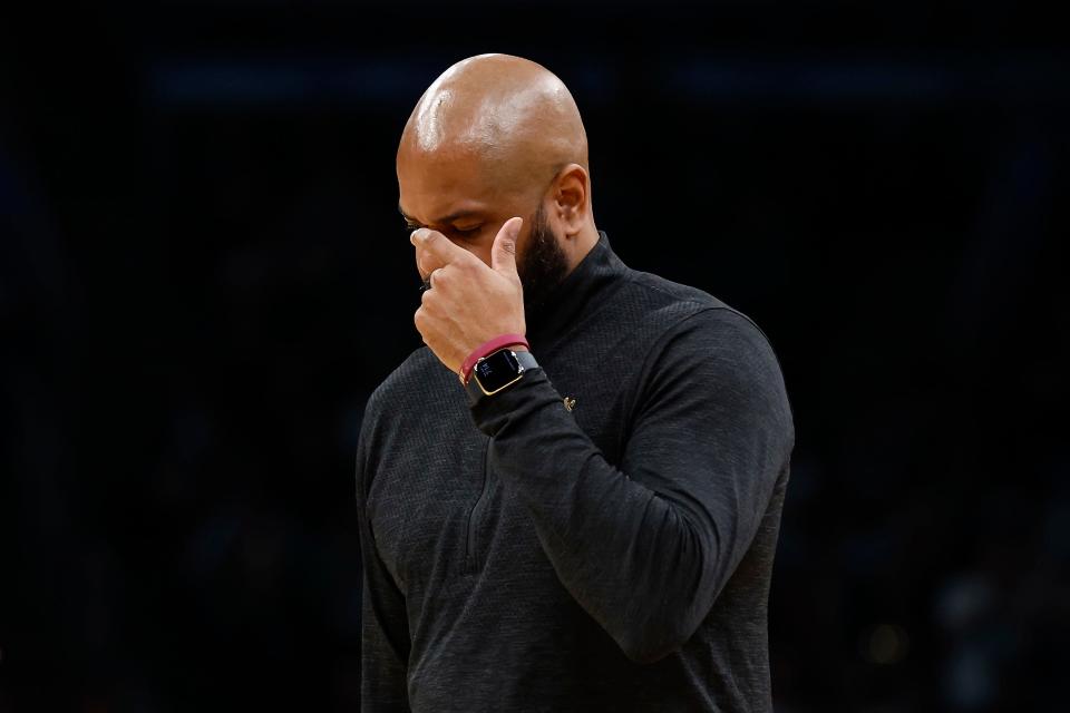 Cleveland Cavaliers coach J.B. Bickerstaff lowers his head after calling a timeout during the first quarter of Game 1 of a second-round NBA playoffs series against the Boston Celtics on Tuesday in Boston, Mass.