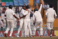 India v England - Third Test cricket match - Punjab Cricket Association Stadium, Mohali, India - 29/11/16.Indian players celebrate the dismissal of England's Adil Rashid. REUTERS/Adnan Abidi