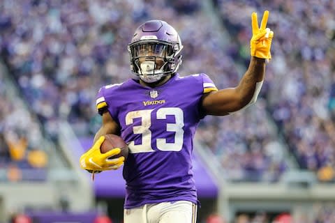 Minnesota Vikings running back Dalvin Cook (33) celebrates a touchdown during the fourth quarter against the Miami Dolphins - Credit: Brace Hemmelgarn/USA TODAY