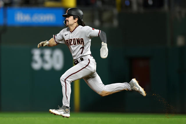 Alek Thomas of the Arizona Diamondbacks high fives Tommy Pham after News  Photo - Getty Images