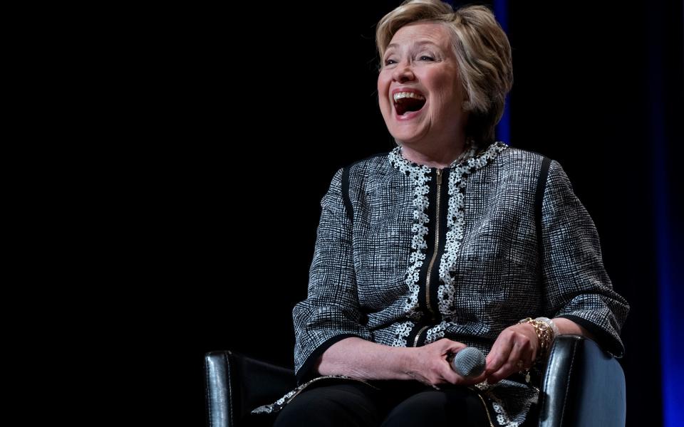 Former Secretary of State Hillary Clinton laughs after taking a question while speaking during the Book Expo event in New York Thursday, June 1, 2017 - Credit: AP