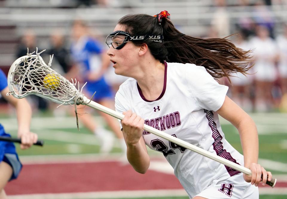 Ridgewood's Mika Ben-Hur. Ridgewood girls lacrosse defeats Westfield, 14-2, in season opener on Thursday, March 31, 2022.