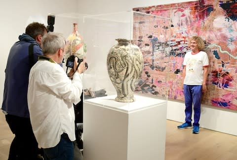 Grayson Perry launches his new exhibition Super Rich Interior Decoration, standing in front of his work titled Large Expensive Abstract Painting 2019, at the Victoria Miro Gallery - Credit: PA