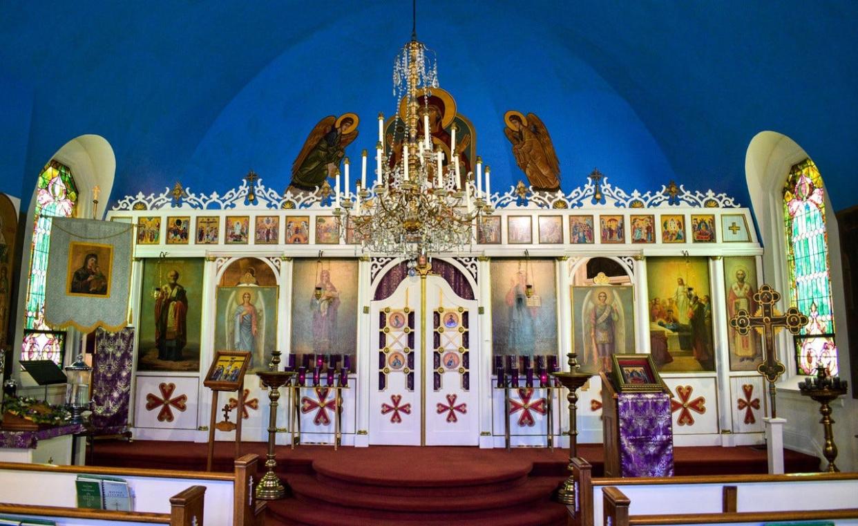 The interior of Holy Assumption Orthodox Church is adorned with historic icons that were gifted to the church by Russian Tsar Nicholas II and Bishop Tikhon, who headed the Russian Orthodox Church in North America.
