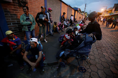 Honduran migrants, part of a caravan trying to reach the U.S., are seen before a new leg of their travel in Esquipulas, Guatemala October 16, 2018. REUTERS/Jorge Cabrera