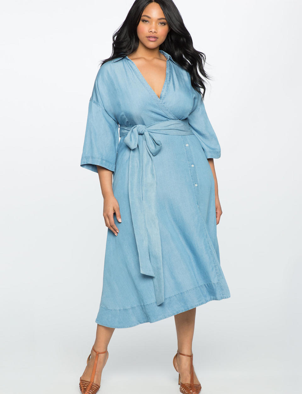 <a href="http://www.eloquii.com/wide-tie-chambray-wrap-dress/1244064.html?cgid=2628-dresses&amp;start=208&amp;dwvar_1244064_colorCode=18" target="_blank">Shop it at Eloquii</a>.&nbsp;