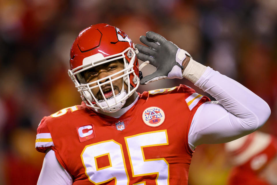 Kansas City Chiefs defensive tackle Chris Jones urges the crowd to make noise during the first half of the NFL AFC Championship playoff football game against the Cincinnati Bengals, Sunday, Jan. 29, 2023 in Kansas City, Mo. (AP Photo/Reed Hoffmann)
