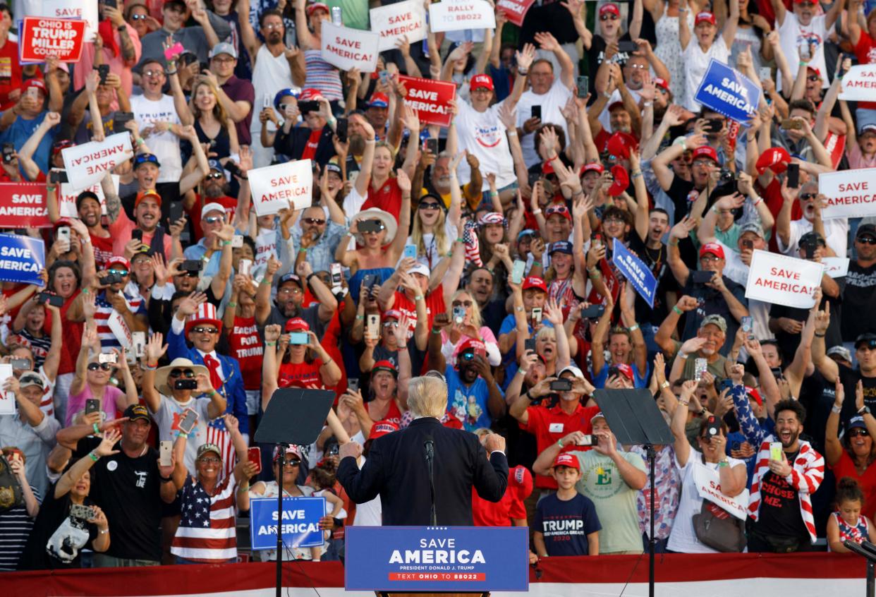 Former US President Donald Trump turns around to face his supporters during his campaign-style rally in Wellington, Ohio, on June 26, 2021. (Stephen Zenner/AFP via Getty Images)