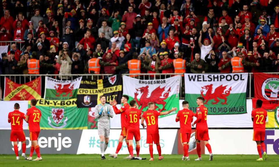 Wales players applaud the support after their 2-0 Euro 2020 qualifying win in Baku in November 2019