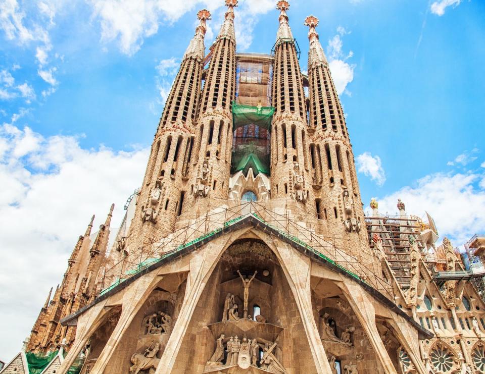 <p>La Sagrada Familia has famously been under construction since it was first designed in 1882. Its original design was of the neo-Gothic style but was reimagined when legendary architect Antoni Gaudí took over the project a year later, shifting toward his signature Catalan-Modernist style. Seven architects have been on the project since Gaudí's death, most recently, Jordi Fauli in 2012, who has carried out the project according to Gaudí's plans. </p>