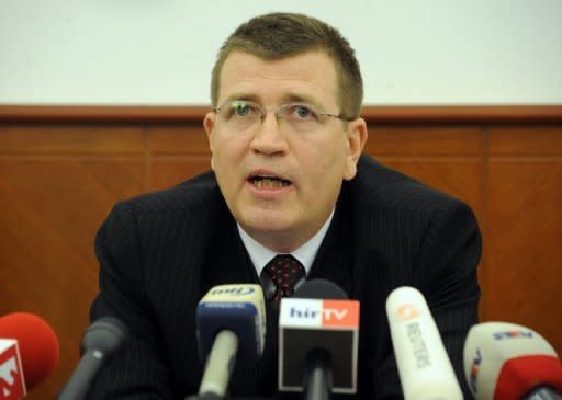 Hungarian prosecutorTibor Ibolya answers questions during a press conference in Budapest. Hungarian authorities detained, grilled and put under house arrest on Wednesday a 97-year-old who tops the Simon Wiesenthal Center's dwindling wanted list of surviving suspected Nazi war criminals