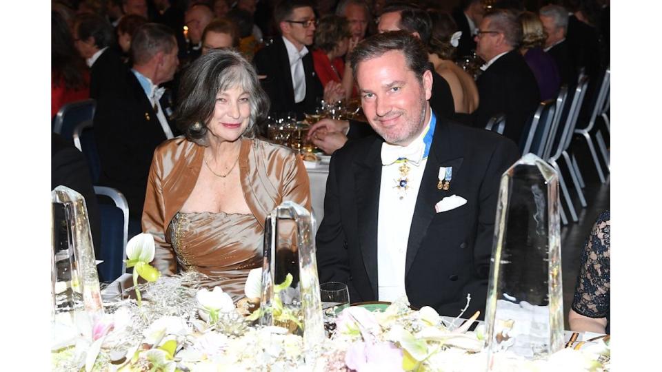 A woman sat with Christopher O'Neill
