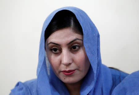 Female Afghan parliamentary election candidate, Dewa Niazai, sits at her office during an election campaign in Jalalabad, Afghanistan October 3, 2018. REUTERS/Parwiz