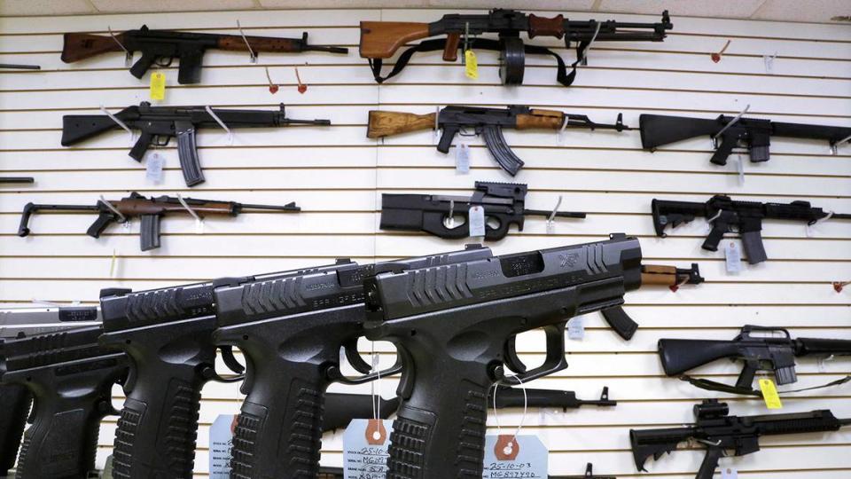 Assault weapons and hand guns are displayed for sale at an Illinois gun shop. Washington state became the 10th state in the U.S. to ban assault weapons on Tuesday, April 25, when Gov. Jay Inslee signed a bill passed by this year’s legislature as part of a sweeping package of proposals aimed at reducing gun violence. An emergency clause in the assault weapons bill made the law effective immediately.