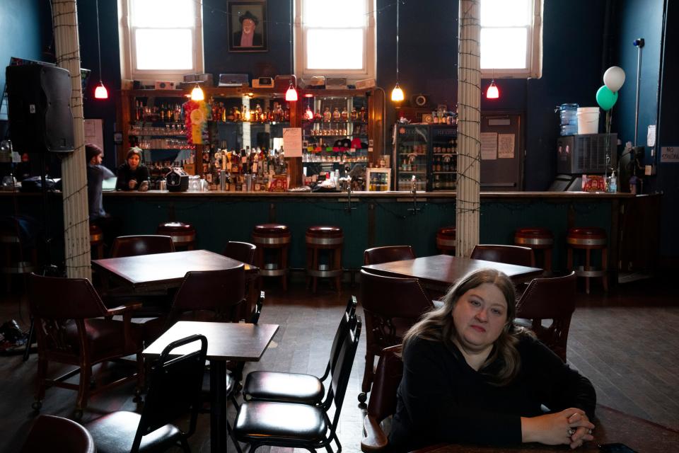Morrella Raleigh, Southgate House Revival owner, sits in the lounge bar area at her establishment in Newport, Ky.