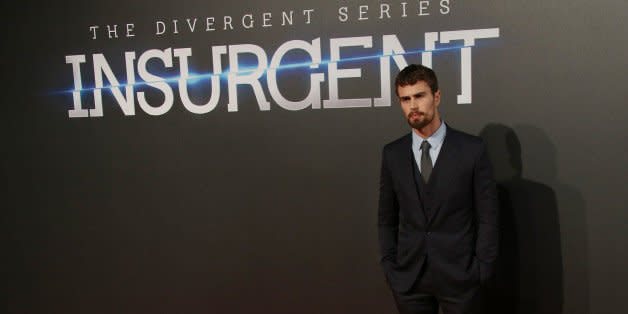 Actor Theo James poses for photographers upon arrival at a central London cinema for the World Premiere of Insurgent, Wednesday, March 11, 2015. The film is part of the Divergent series and set in the dystopian ruins of a futuristic Chicago. (Photo by Joel Ryan/Invision/AP) (Photo: )