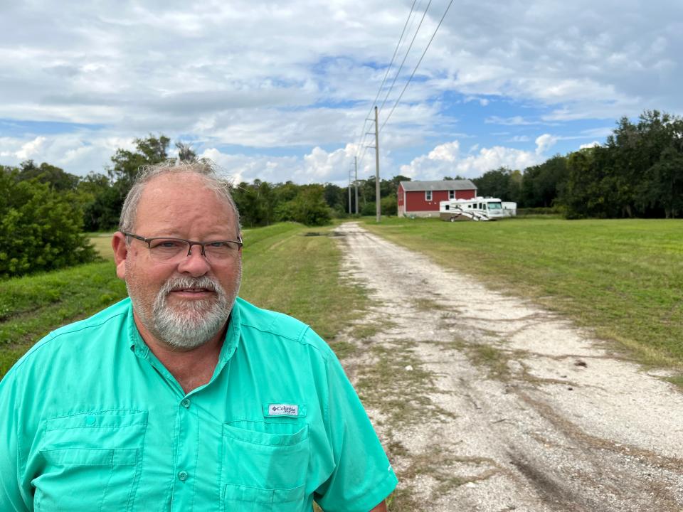 Robin Hanger stands on the site of a future RV resort he hoped to build at 490 Flomich St. in Holly Hill on Oct. 18, 2022. The Holly Hill native sold the 25-acre former dairy farm on Oct. 6, 2023, to Julie Mericle Smith of DeLand and Larry Kaylor of Colorado after the two pledged to build the project, in part to cater to pickleball enthusiasts who play at the Pictona complex down the street. Smith and Kaylor hope to break ground on the planned Lake Belle RV Resort by year's end.