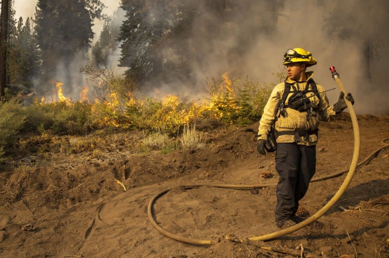 At Thursday's Homeland Security and Governmental Affairs committee hearing in Washington, D.C., lawmakers were advised that federal agencies' responses to wildfires should be reformed to better protect communities and regions from damage (such as the kind caused by the Caldor wildfire in California in 2021, pictured). File Photo by Peter DaSilva/UPI