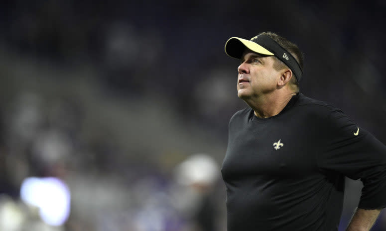 A closeup of New Orleans Saints coach Sean Payton wearing a black visor.