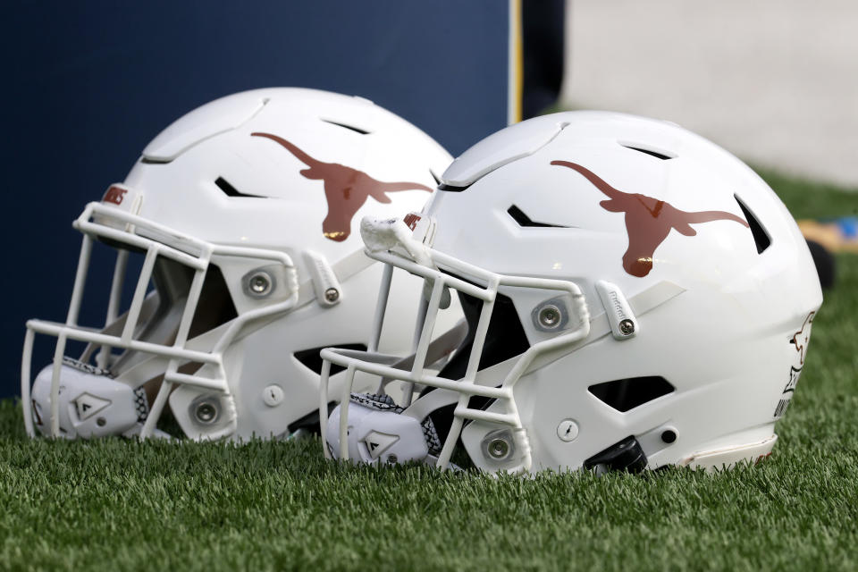 MORGANTOWN, WV - NOVEMBER 20: Texas Longhorns helmets on the sideline prior to the college football game between the Texas Longhorns and the West Virginia Mountaineers on November 20, 2021, at Mountaineer Field at Milan Puskar Stadium in Morgantown, WV. (Photo by Frank Jansky/Icon Sportswire via Getty Images)