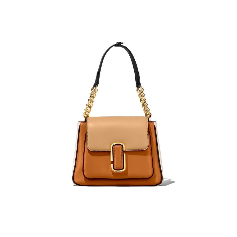 <p><a href="https://go.redirectingat.com?id=74968X1596630&url=https%3A%2F%2Fwww.farfetch.com%2Fshopping%2Fwomen%2Fmarc-jacobs-the-mini-chain-satchel-bag-item-19136099.aspx&sref=https%3A%2F%2F" rel="nofollow noopener" target="_blank" data-ylk="slk:Shop Now;elm:context_link;itc:0;sec:content-canvas" class="link rapid-noclick-resp">Shop Now</a></p><p>The Mini Chain Satchel Bag</p><p>farfetch.com</p><p>$225.00</p>