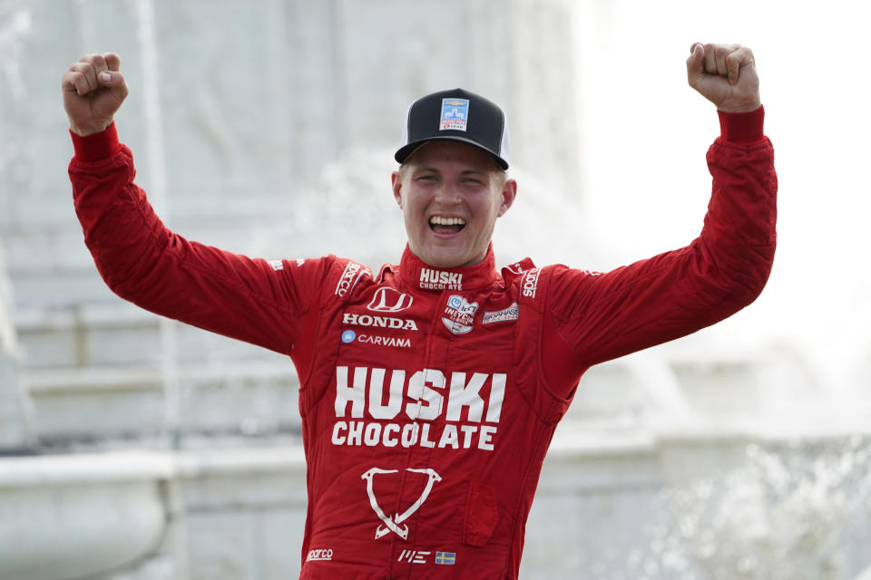 Marcus Ericsson, of Sweden, celebrates winning the first race of the IndyCar Detroit Grand Prix auto racing doubleheader on Belle Isle in Detroit, Saturday, June 12, 2021. (AP Photo/Paul Sancya)