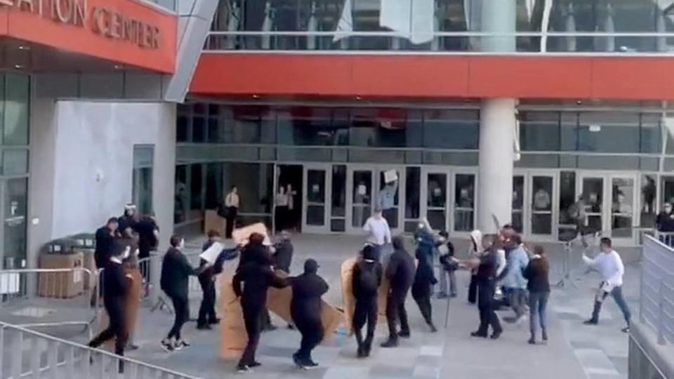 A still photo from a video shows the moment protesters and law enforcement clashed in front of the Cal Poly Rec Center on Jan. 23, 2024. A small group of people involved in a pro-Palestine protest reportedly attempted to breaking into the building where a winter career fair was being hosted.